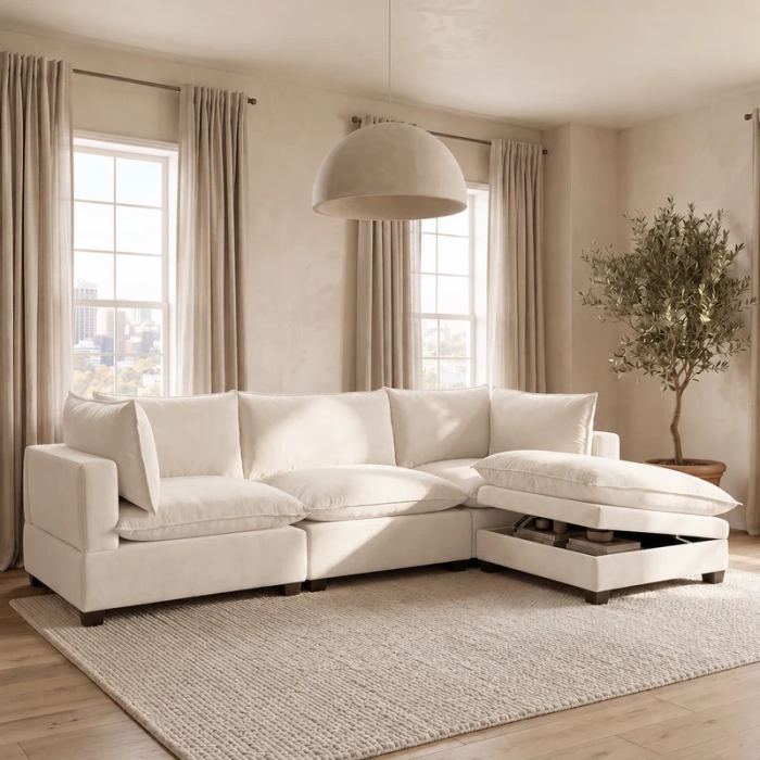 Norwick Cream Velvet Cloud Couch — Cream velvet cloud couch shown in a room with the chaise cushion lifted.
